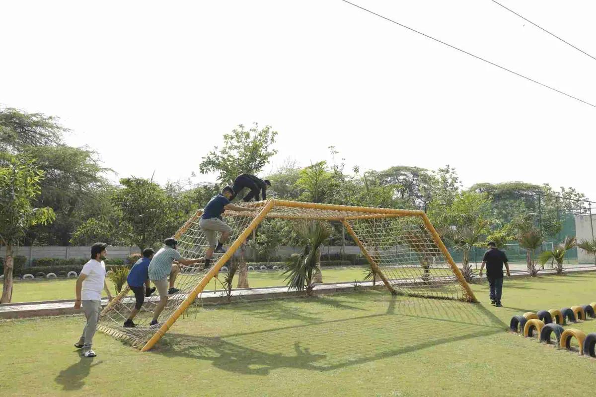 An open lawn with games on a team day out